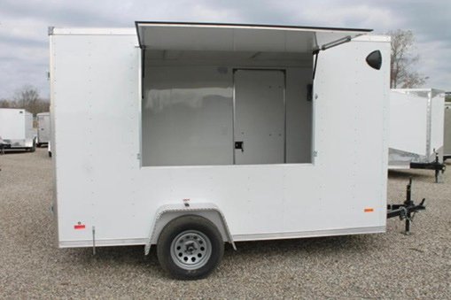 White Summer Snow trailer with service window open